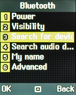 Scroll to Search for device and press the Navigation key.
