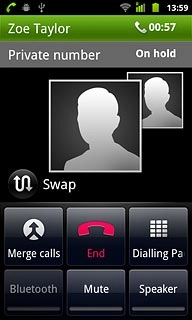Make sure the call you want to end is active.Press End.The active call is ended and the call on hold is automatically activated.