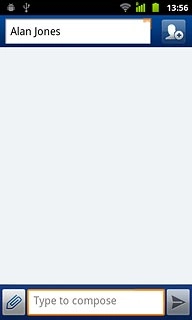 Press and hold the text input field until a pop-up menu is displayed.