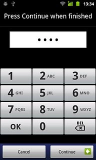 Key in the required phone lock code and press Continue.