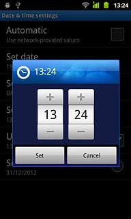 Press + or - next to hours and minutes to set the time.