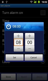Press + or - next to hours and minutes to set the time.