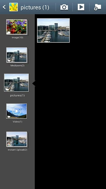 Go to the required folder.Press the required picture or the required video clip.