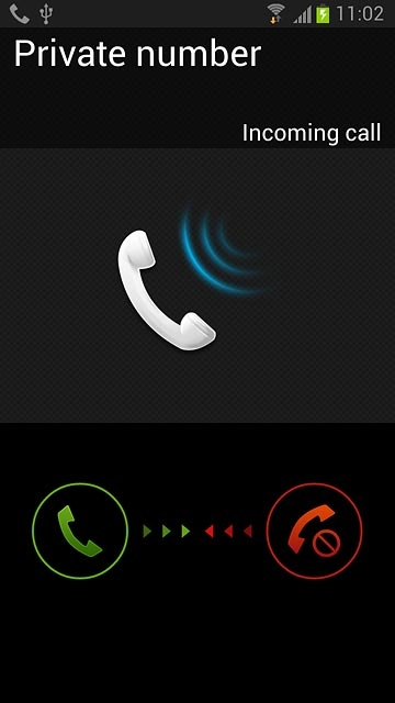 Press the reject call icon and drag the icon left.