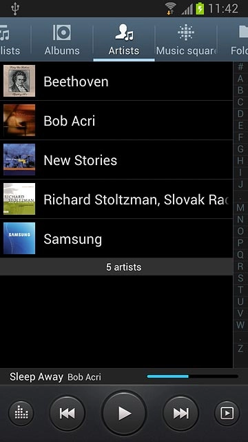 Press the required category at the top of the display.Go to the required audio file.