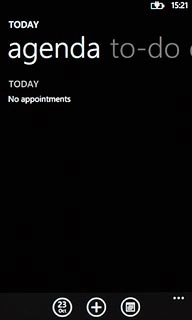 To go to month view:Press the month view icon.