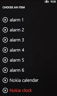Press the playback icon next to the different alarm tones to hear them.