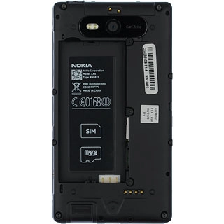 Turn the memory card as illustrated next to the memory card holder.