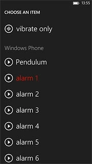 Press the playback icon next to the different alarm tones to hear them.
