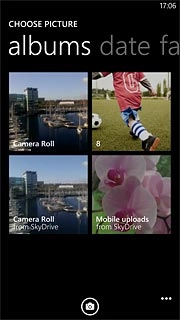 To take a new picture:Press the camera icon.