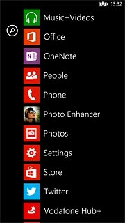 Slide your finger left on the display.Press Music+Videos.