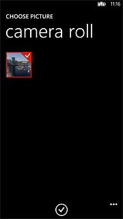 When a picture or video clip is ticked (V), it's selected.