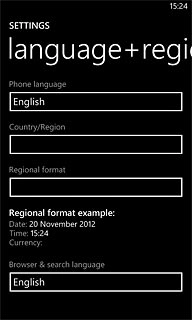 Press the field below Phone language.