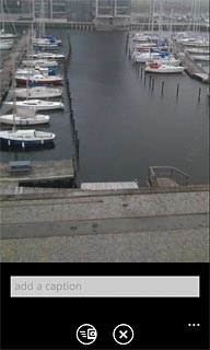 Press add a caption and key in text for the picture.