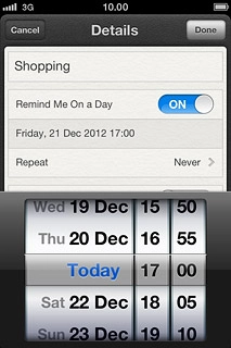 Drag the wheels to set the date and time.