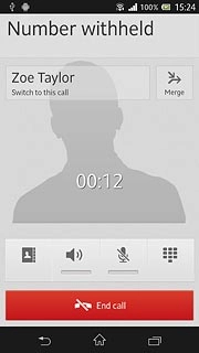 The active call is displayed at the centre of the display.Press Switch to this call to turn on the call on hold.