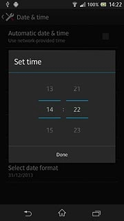 Slide hours and minutes up or down to set the time.