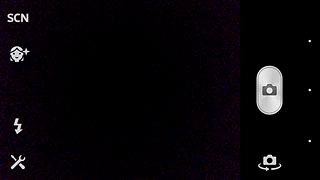 Press the camera icon to take the picture.The picture is saved automatically.