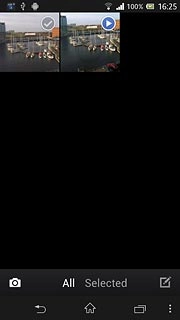 To take a new picture:Press the camera icon.