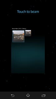 Hold your device and the receiving device back to back.When Touch to beam is displayed, press anywhere on the display to start the transfer.Follow the instructions on the display to finish the transfer.