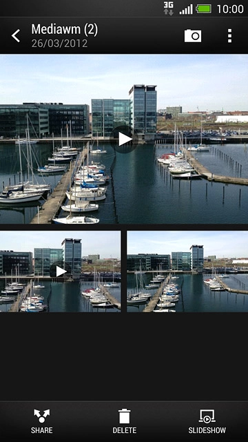 Go to the required folder.Press and hold the required picture or the required video clip.