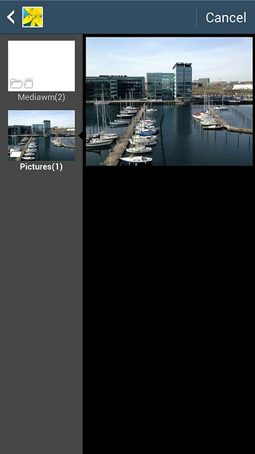 Go to the required folder.Press the required picture.