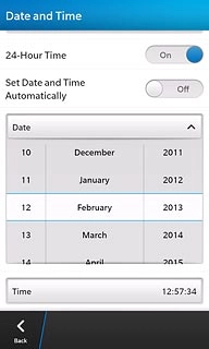 Press day, month and year and slide your finger up or down the display to set the required date.