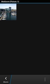 Press and hold the required file until a pop-up menu is displayed.