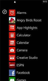Slide your finger left on the display.Press Alarms.