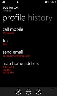 Press the merge icon.A list of contacts is displayed.