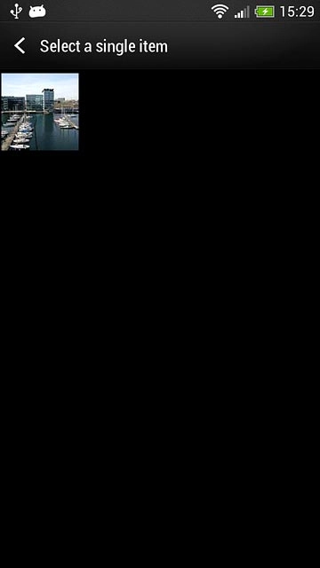 Go to the required folder.Press the required picture.