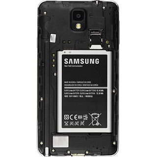 Place the battery in your phone, top first, matching the battery contacts with the phone contacts and press the battery into place.