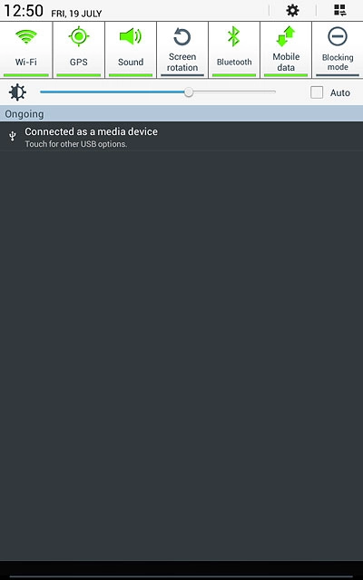 Slide your finger down the display starting from the top edge of your tablet.Press Bluetooth until the function is turned on.