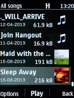 Go to the required folder.Highlight the required audio file or the required playlist and press the Navigation key.