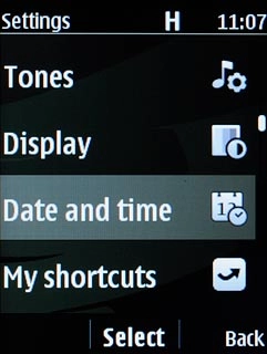 Scroll to Date and time and press the Navigation key.