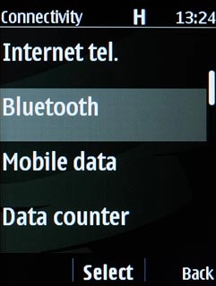 Scroll to Bluetooth and press the Navigation key.