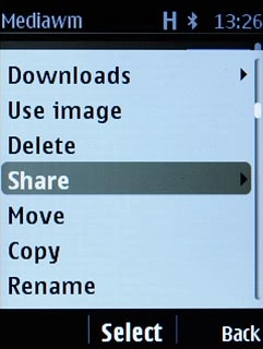 Scroll to Share and press the Navigation key.