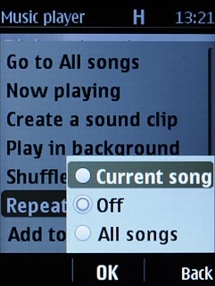 Highlight Current song, Off or All songs and press the Navigation key.