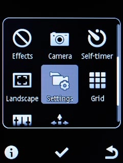Scroll to Settings and press the Navigation key.