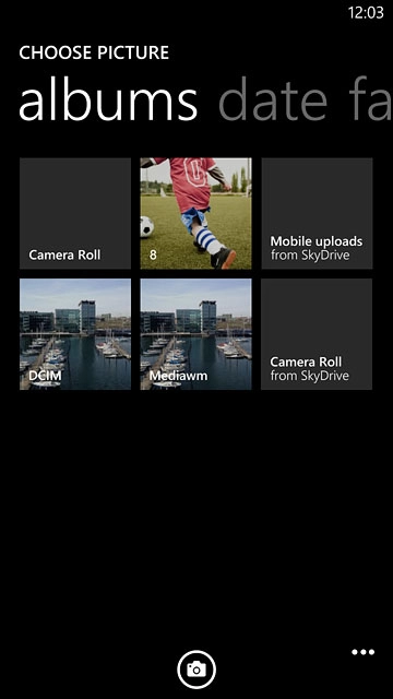 To take a new picture:Press the camera icon.