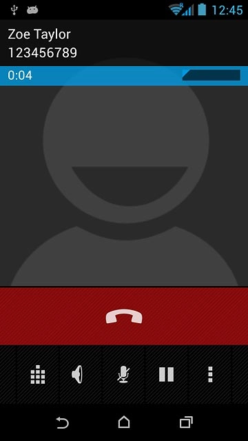 Press the end call icon.