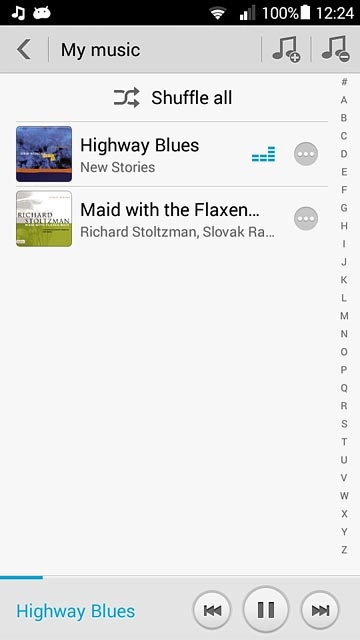 Press the name of the audio file at the bottom of the display.