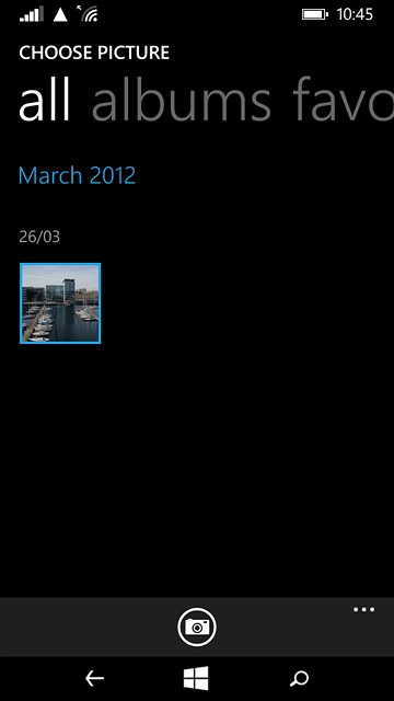 To take a new picture:Press the camera icon.