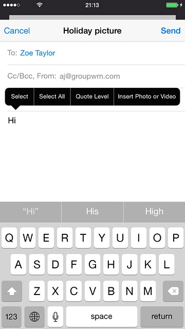 Press and hold anywhere on the text input field.Press Insert Photo or Video.