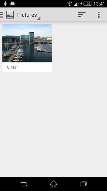 Go to the required folder.Press the required picture.