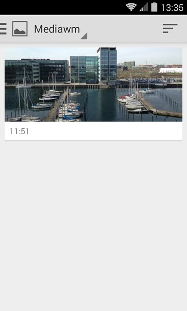 Go to the required folder.Press the required picture.