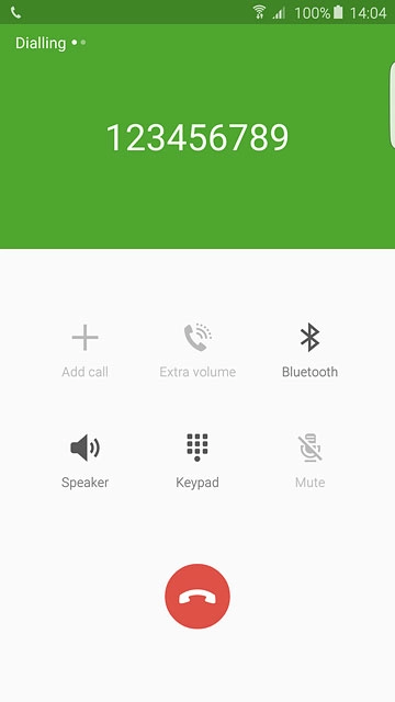 Press the end call icon.