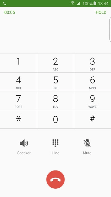 Press the end call icon to end the call.