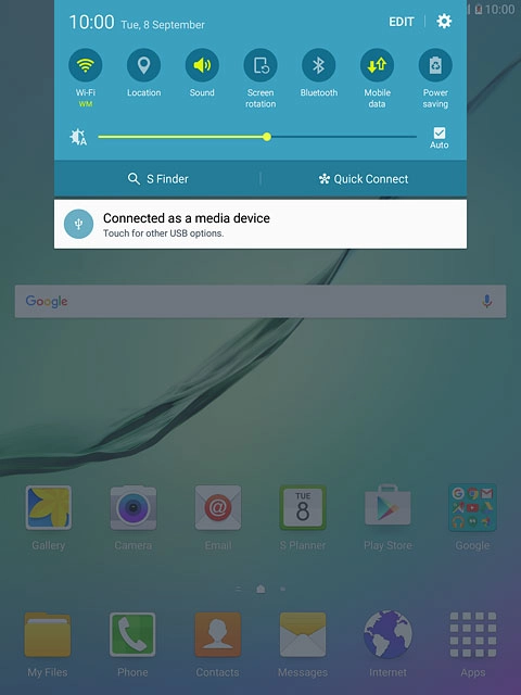 Slide your finger down the display starting from the top edge of your tablet.Press Connected as a media device.