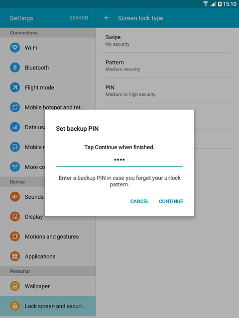 Key in a four-digit PIN and press CONTINUE.